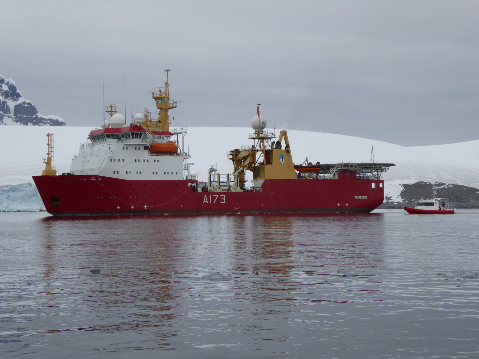 The HMS Protector supports British operations in Antarctica. It was picking up some of the folks working at Port Lockroy.