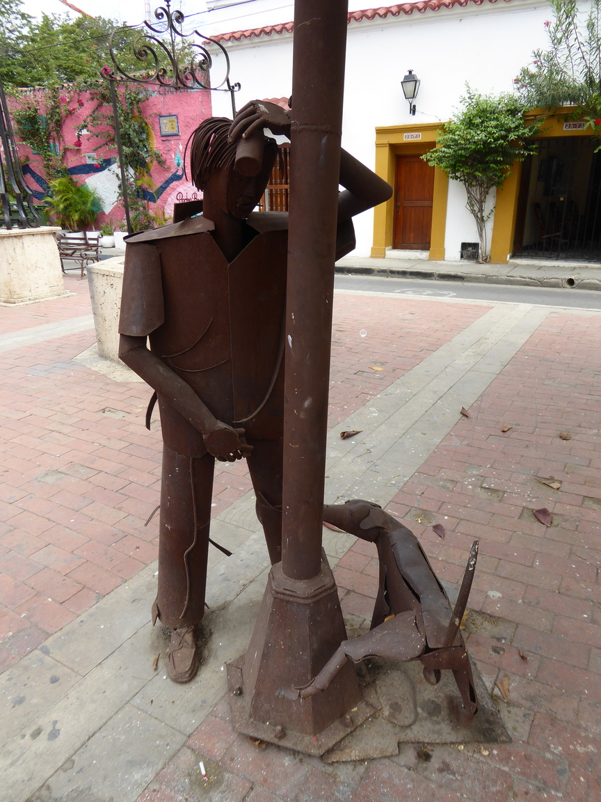 Metal drunk guy and dog peeing sculptures!