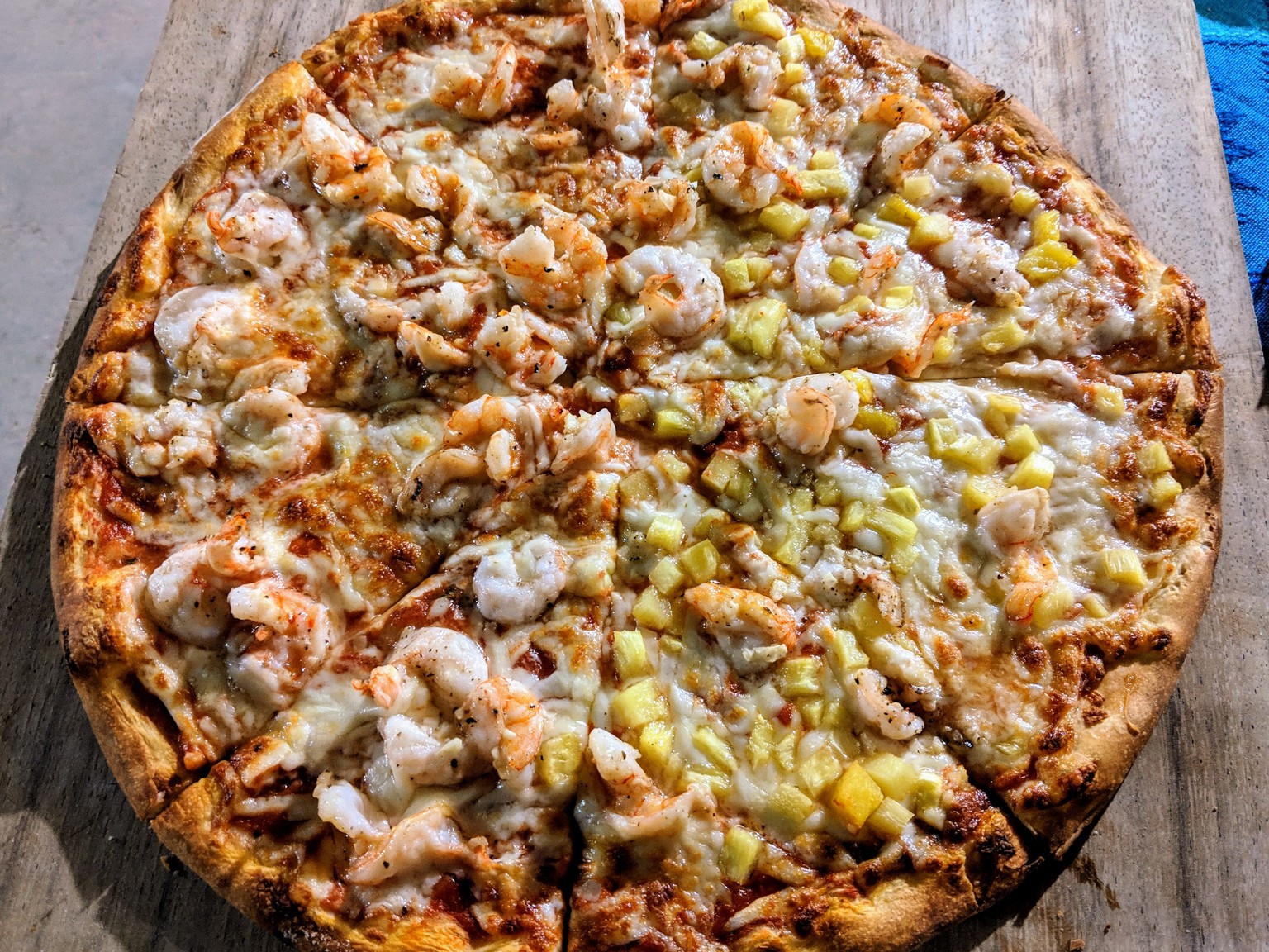 Shrimp and half pineapple pizza