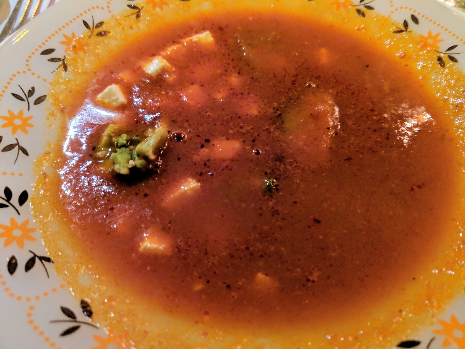 The first course of our Christmas dinner, a tomato and cheese soup with avocado. Really tasty with a slight tang.