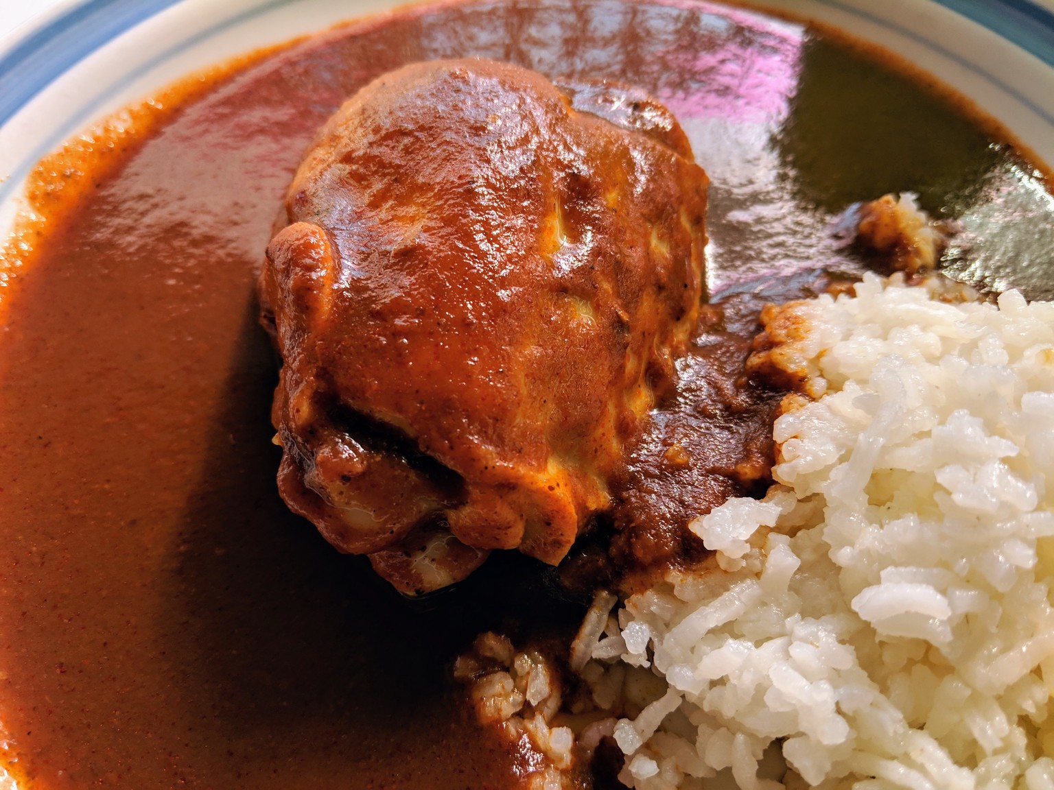 Chicken coloradito with rice. This is another type of mole.