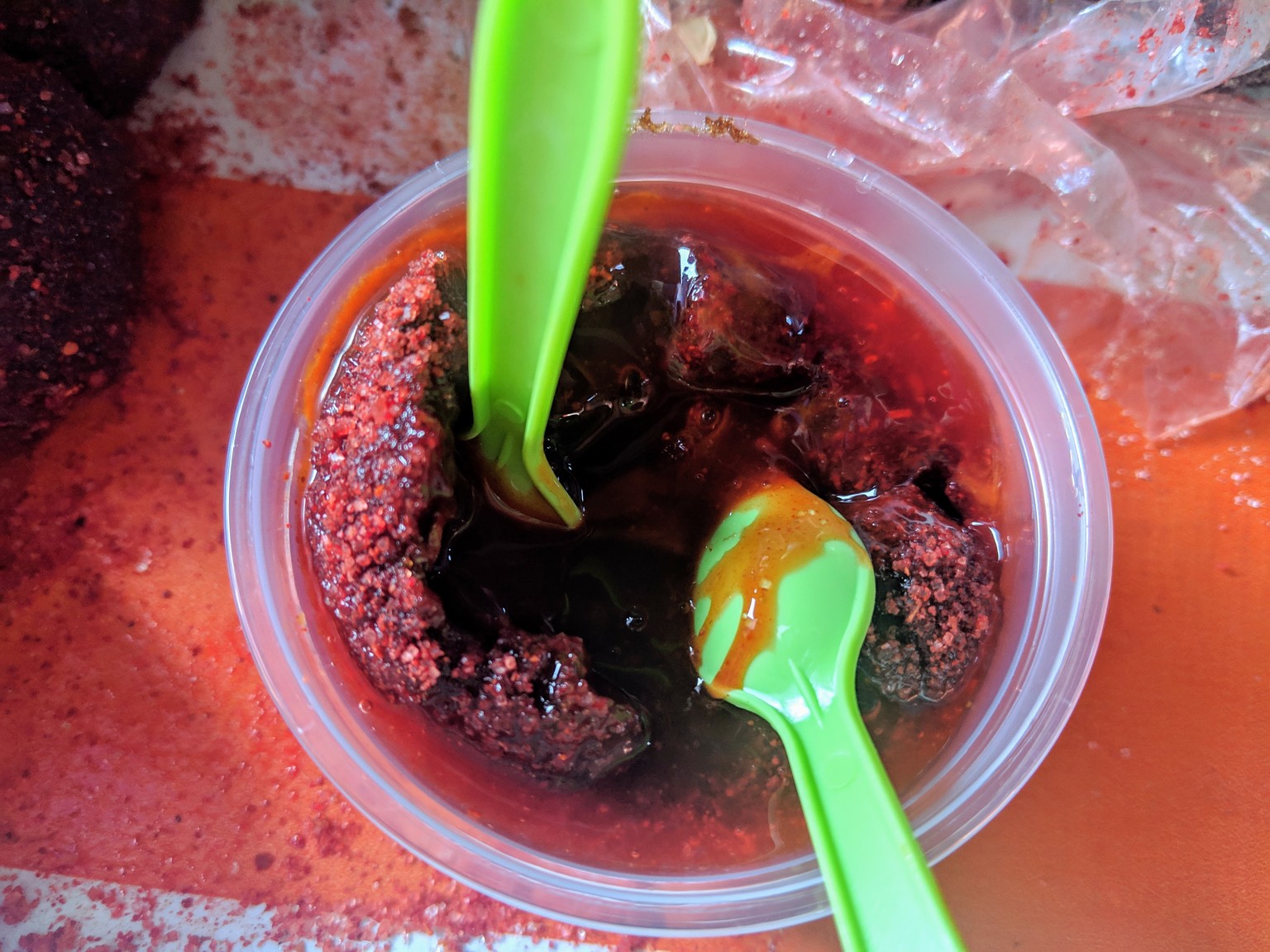 Tamarind with sweet sauce and chili pepper.