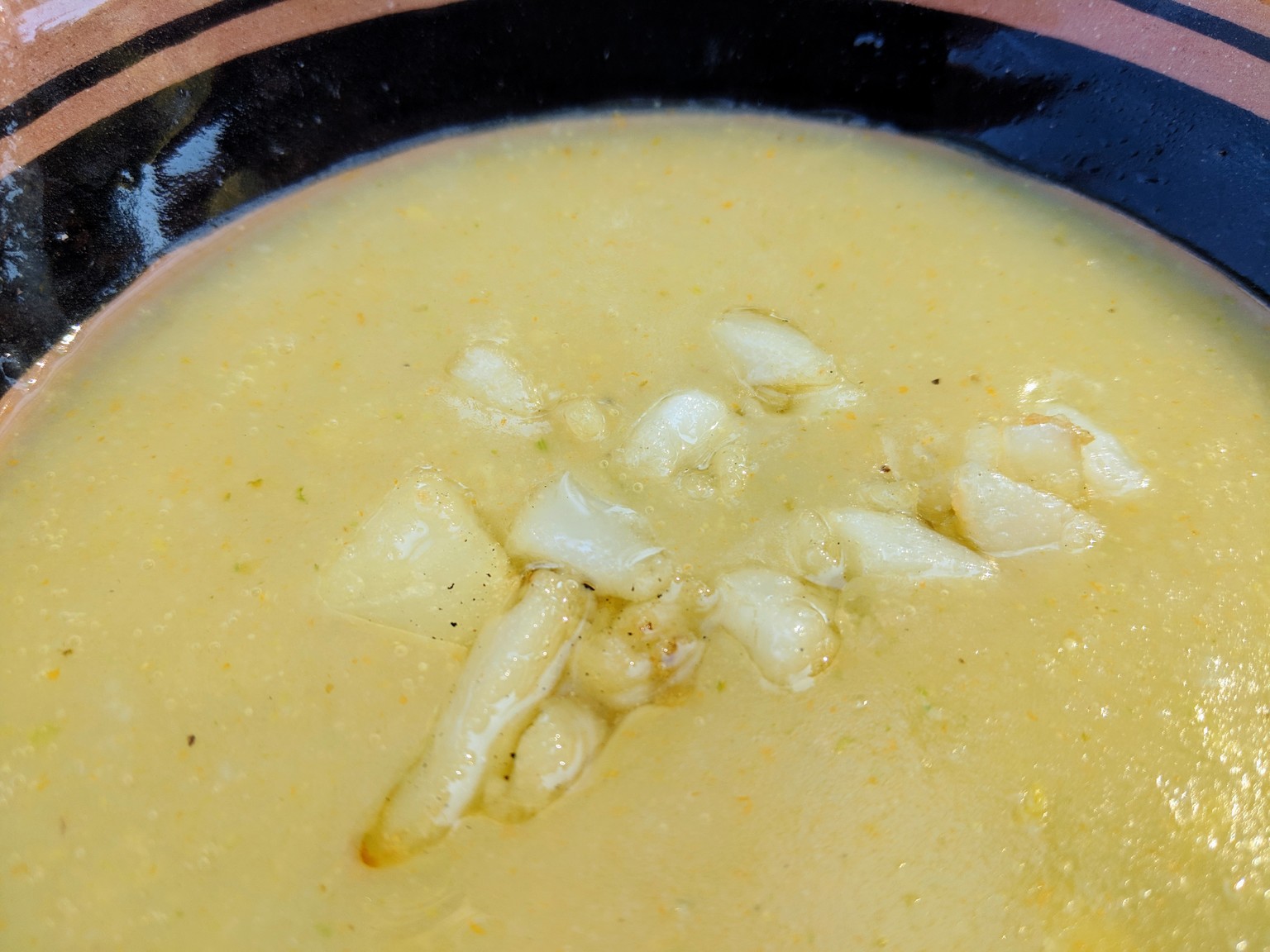 Garlic and onion going into the soup.