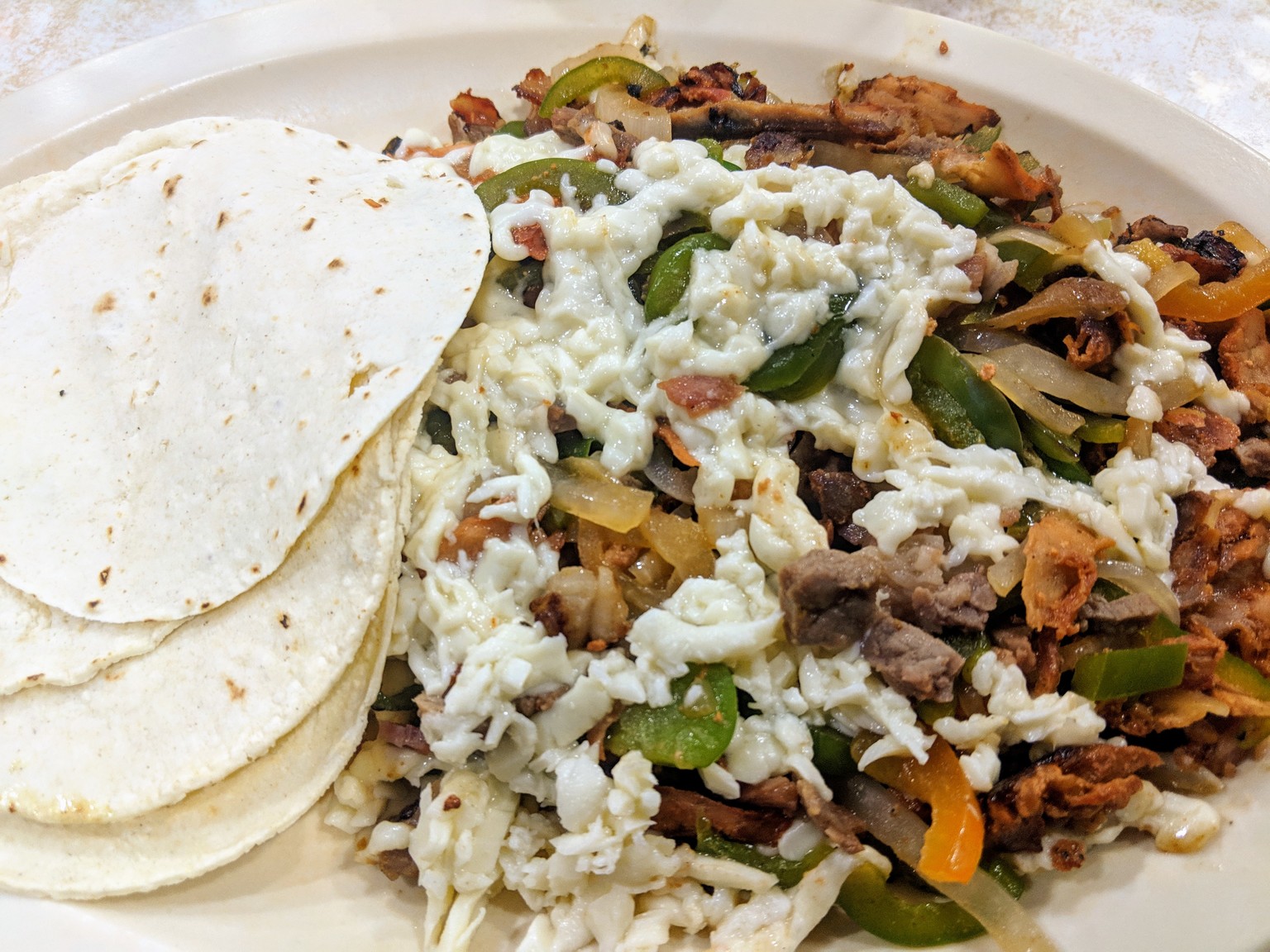 Can't remember what this dish is called. Interestingly it's not fajitas, in fact we have discovered that fajitas are very regional, and mostly found in the north of Mexico.