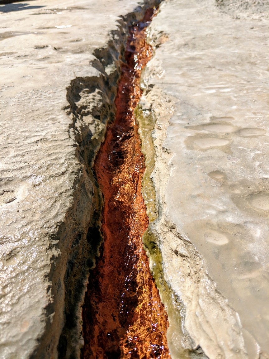 One of the natural channels the water has formed. So pretty!