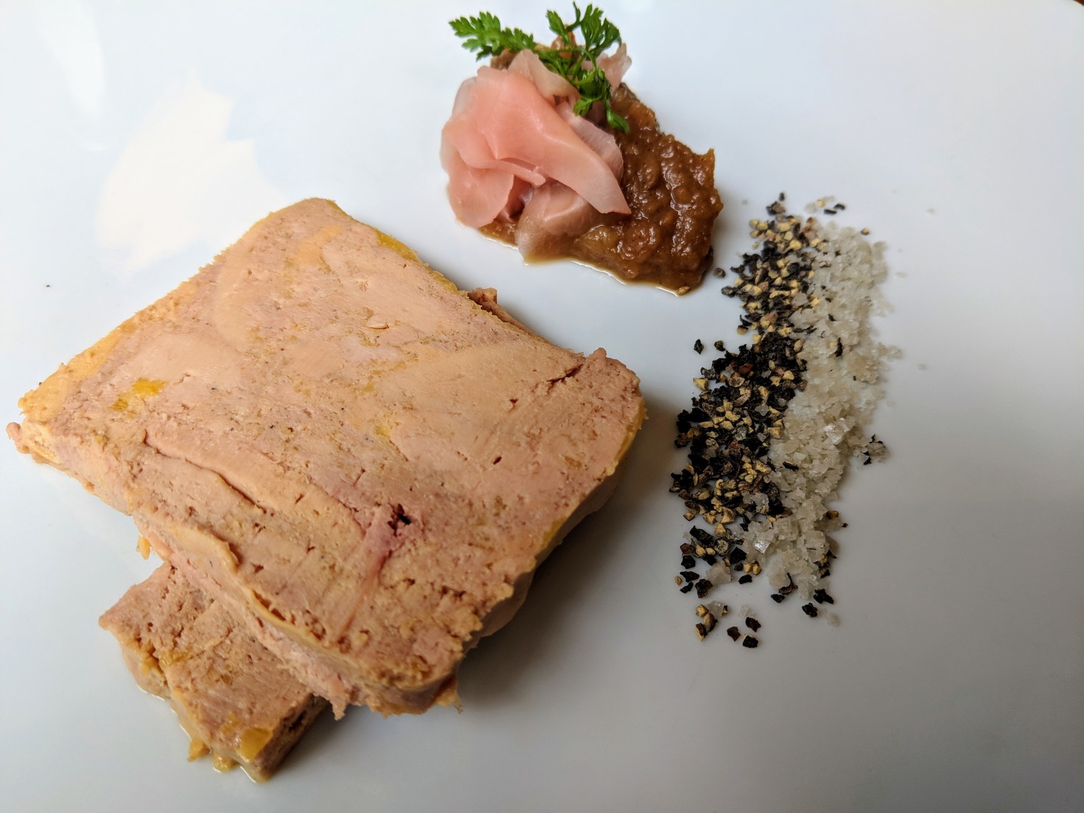 Foie gras with ginger, chutney, salt and pepper.
