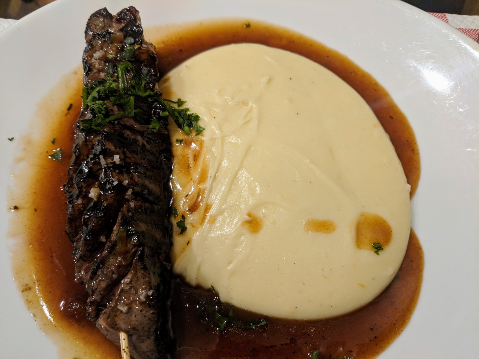 Honey glazed duck breast with aligot. Aligot is basically cheesy mashed potatoes. So tasty!