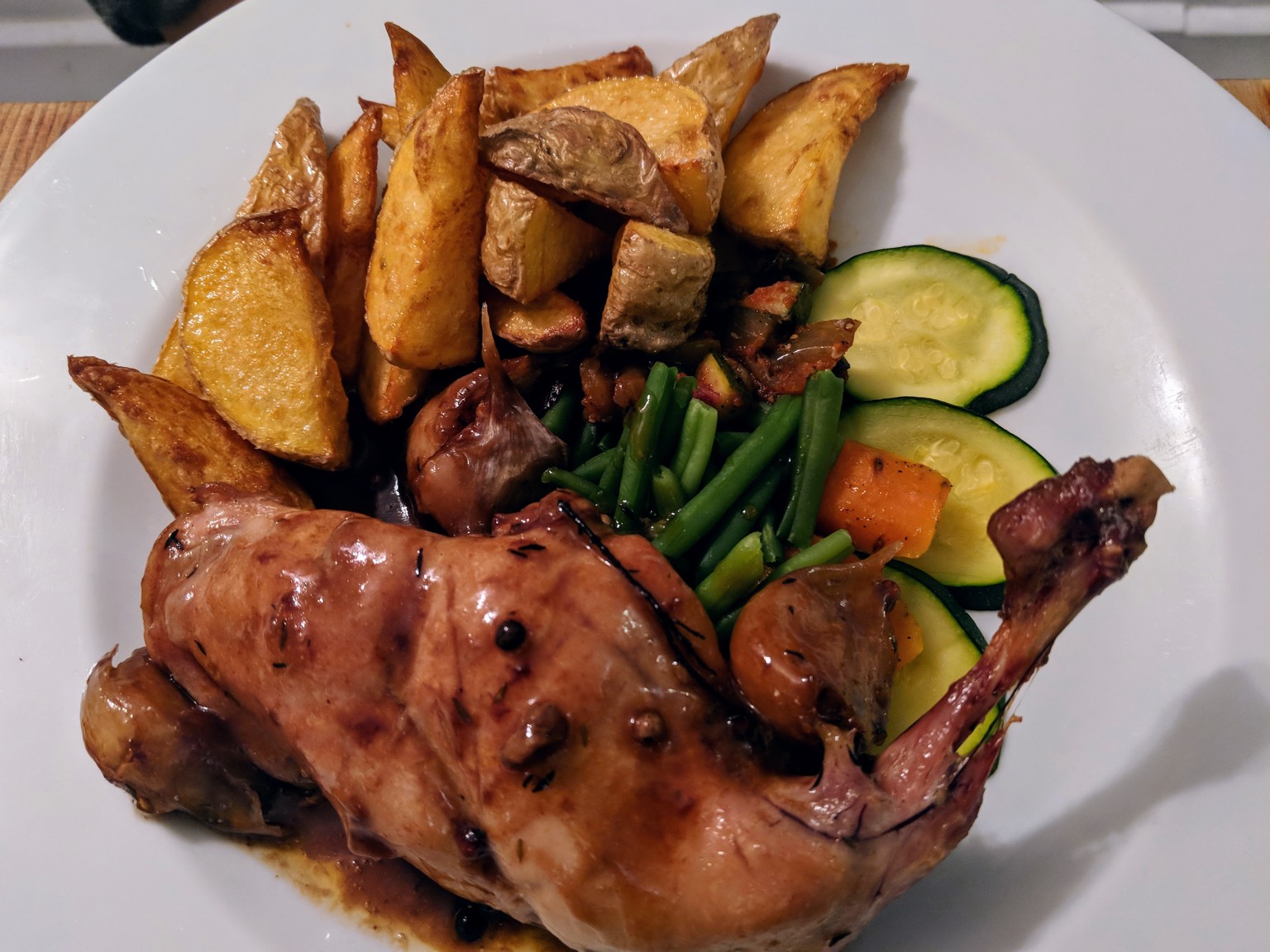Rabbit with roasted potatoes and steamed veggies