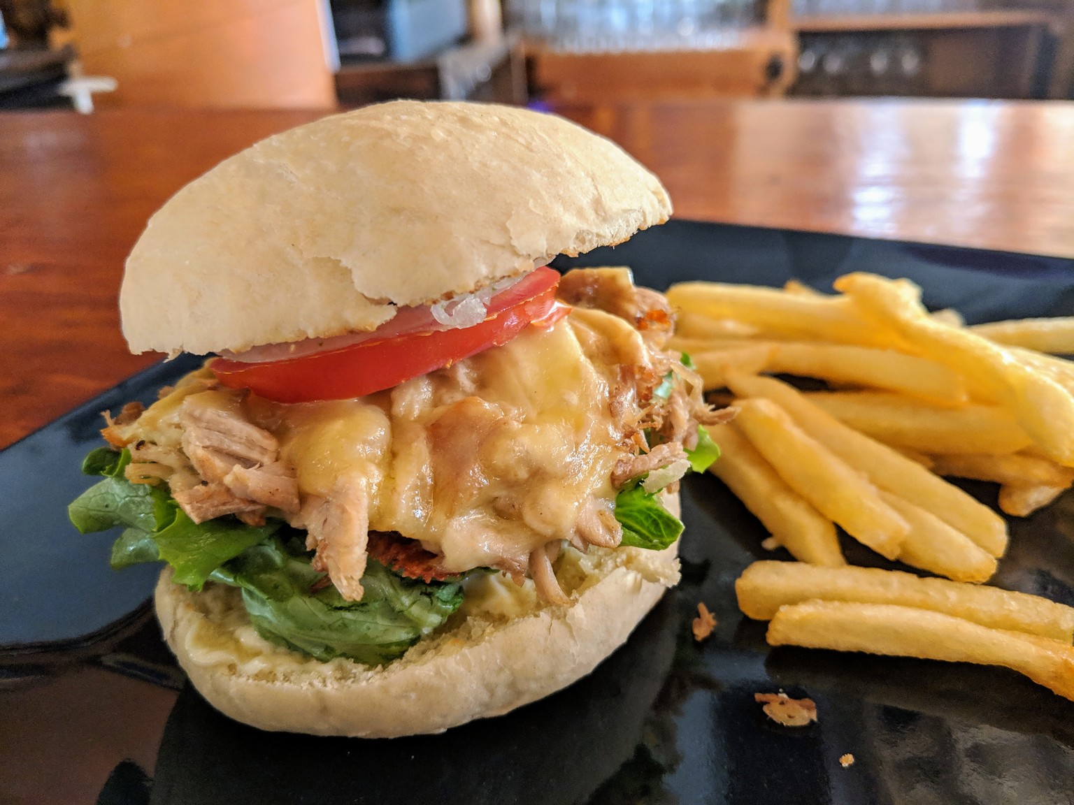 Carnitas sandwich with cheese. Pretty good, but not very authentic. No surprise since the place is run by Americans.