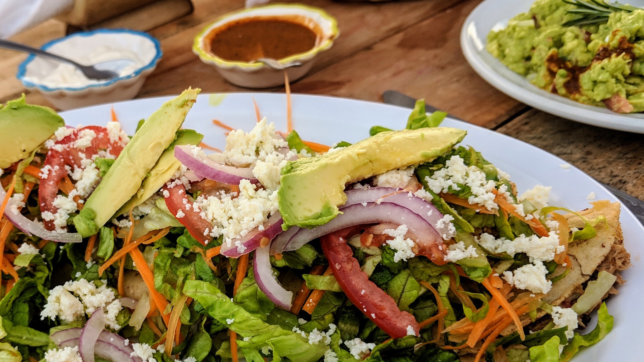 It's hard to see, but under all that salad are fish tacos.